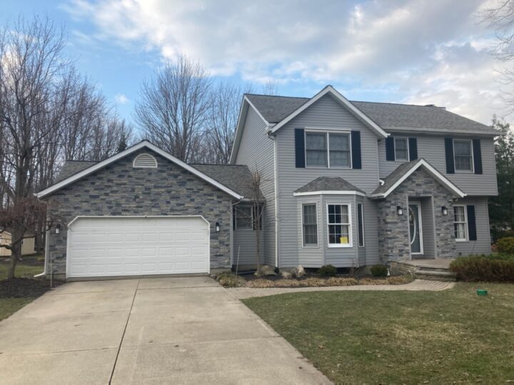 John’s Faux Stone Garage Siding and Front Door